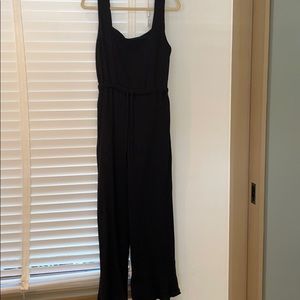 Anthropologie black flare leg jumpsuit
